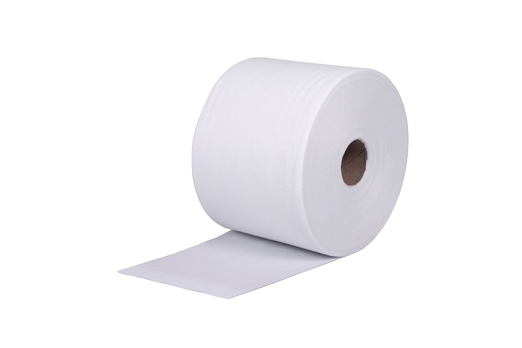 codex_Dummy_AX 700_Vlies_2024-04 A close-up of a large white toilet paper roll on a white background. The roll is partially unrolled, showing a smooth, slightly textured paper surface and a visible brown cardboard core. The lighting is even and the scene is minimal, emphasizing the clean, soft appearance of the paper.